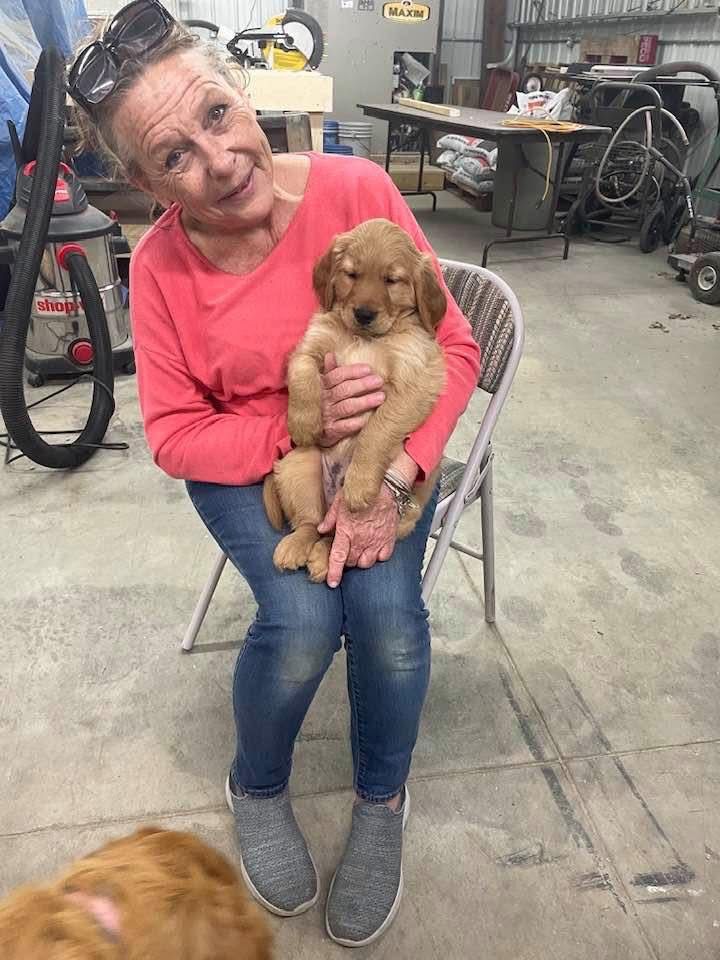 Family meeting their puppy